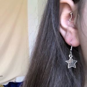 Silver American flag earrings.